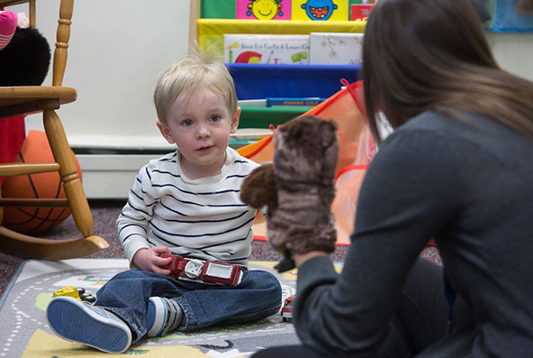 child playing in play room
