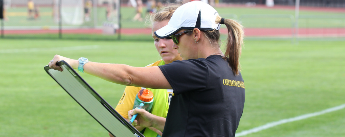 coach with athlete